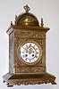 French unsigned cast and hammered brass unsigned mantel clock, S. Marti 8-day time and strike movement, c.1890.