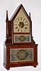 Birge and Fuller, Bristol, Conn., wagon spring mov't in "Single Candlestick Sharp Gothic" on frame, mahogany veneer case, 30 hour time and gong strike, c1845