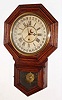 Wm.L. Gilbert Clock Co., Winsted, Conn., "No. 3027" oak "Octagon Drop" time and calendar short-drop school clock, C.1910.