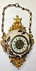 French "Fot Bte" hanging porcelain cartel clock, with cast decorations, 8-day time and strike clock, C.1900.