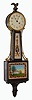 Waltham Clock Co., Waltham, Mass., "No. 1550" miniature banjo wall clock 8 day time only key wind spring driven movement in mahogany round front case with reverse painted throat and lower tablets, c1930