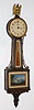 Waltham Clock Co., Waltham, Mass., "No. 1555" miniature banjo wall clock 8 day time only back wind spring driven movement in mahogany rope front case with reverse painted throat and lower tablets, c1930