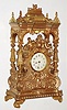 French canopy clock 8 day time only spring driven movement with platform escapement spanning the plates, in a brass case with porcelain dial, c1880