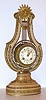 French lyre form mantel clock made for Tiffany and Co. New York (signed on movement and dial) with 8 day time and bell strike, spring driven movement in creamy onyx and ormolu case, c1890