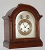 Junghans, German, 8-day time/strike Westminster chime oak mantel clock, C. 1910