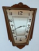 Waltham Watch and Clock Co., C. 1929 "Antique Gilt Modernistic" 8-day wall timepiece. This model was available with a 7 or 15 jewel movement.
