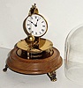 Horolovar Co., NY, C. 1975, repro of the Briggs rotary pendulum timepiece, 8-day, bottom wind with glass dome.
