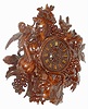 Swiss, probably Interlaken area, Black Forest style carved wooden cartel clock, with grapes, pomegranate and plums amid leaves and with birds at top, fitted with a French, Vincenti 8-day time and bell strike movement.