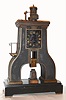 French, Guilmet, (mov't by Japy Freres), STEAM HAMMER clock from the French Industrial series designed by Guilmet, 8-day time/strike, the vertical impact "hammer "serving as the pendulum after power has been transferred 9 times, "as found" c1880