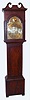 W. Dickie, Paisley, Scottish tall case clock, 8 day time and strike weight driven movement in mahogany veneer broken arch case with arched brass dial and seaweed spandrels, displaying date dial at 6 o'clock and second's bit at 12 o'clock and signed W. Dickie Paisley on disc in arch, c1800