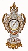 French, lady's boudoir timepiece, in a porcelain case, with a very small cylinder 'scape movement with fancy dial and hands, C. 1900