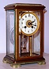 French, Mougin for H and H, 8-day time/strike brass and glass with green onyx top and feet crystal regulator, C.1910