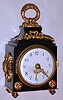 French, "Pendule d'officier", 8-day dore bronze travel timepiece. These timepieces are copies of the type made in the 18th and early 19th century fitted with a platform escapement like those used in a carriage clock, c1900