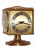 Swiss, Gubelin, 8-day dore metal timepiece weather station with Barometer, Hygrometer, Thermometer and Compass on a swivel base.