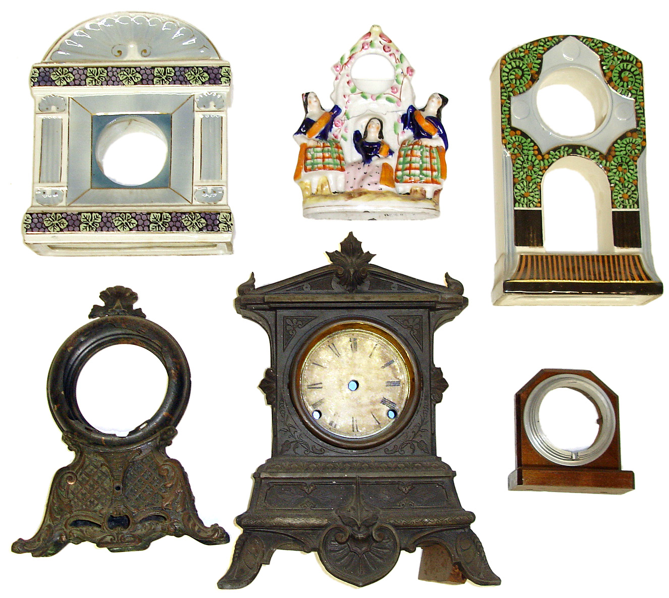 Six clock cases including three hand painted Chinas (one repaired), one small wood, 2 cast metal (one with dial) — Antique Clocks Price Guide