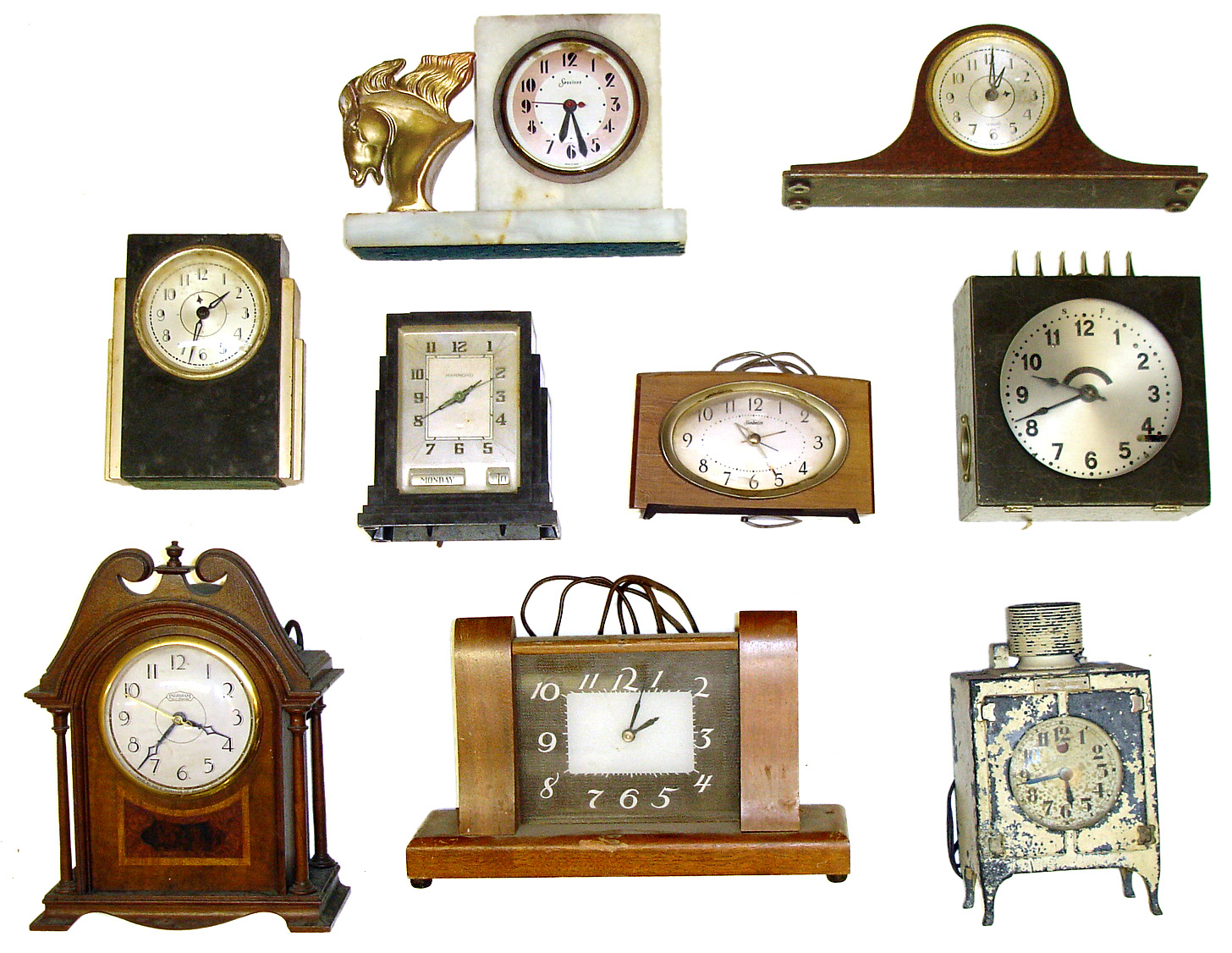 Nine plug in electric clocks. Includes 2 Sangamo, a Hammond calendar, McClintock time switch, Sessions marble, Ingraham pillar and scroll, GE refrigerator, etc. — Antique Clocks Price Guide