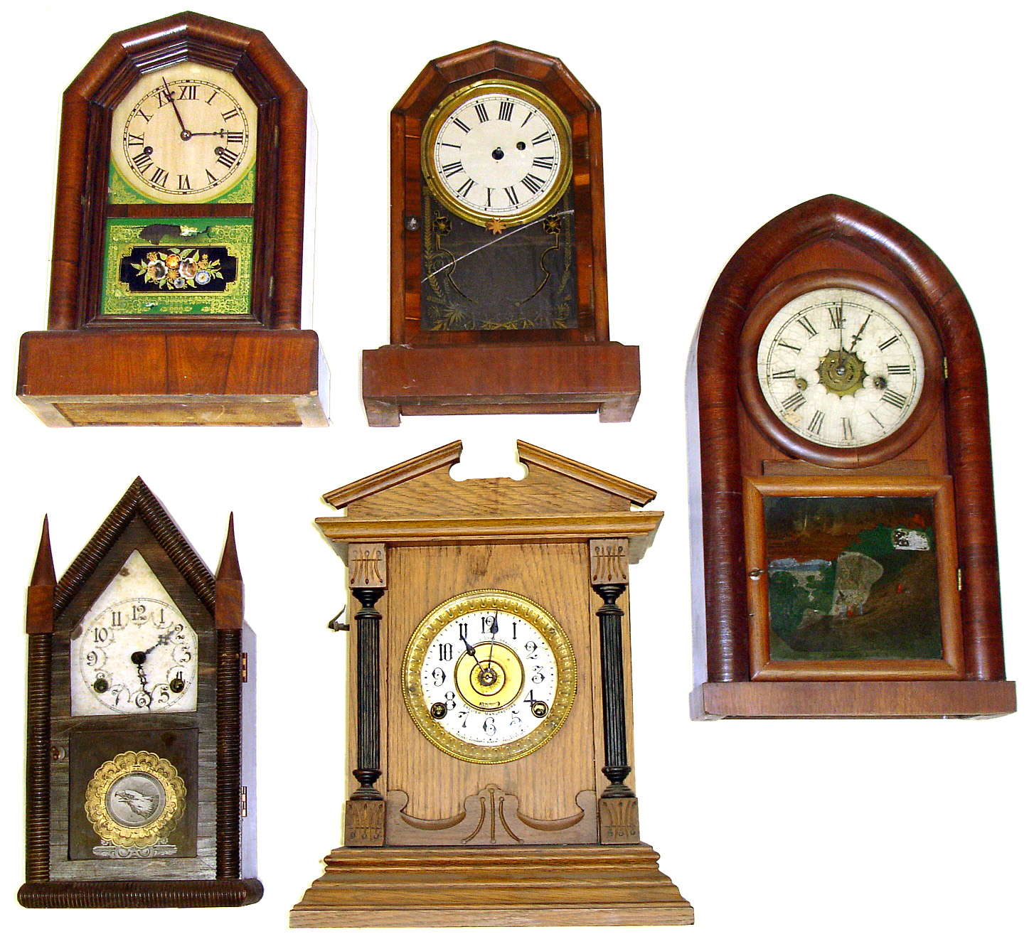 Five wood case shelf clocks. Includes Waterbury beehive, 2 octagon tops, small steeple with bold eagle glass, and Fattorini English alarm oak. — Antique Clocks Price Guide
