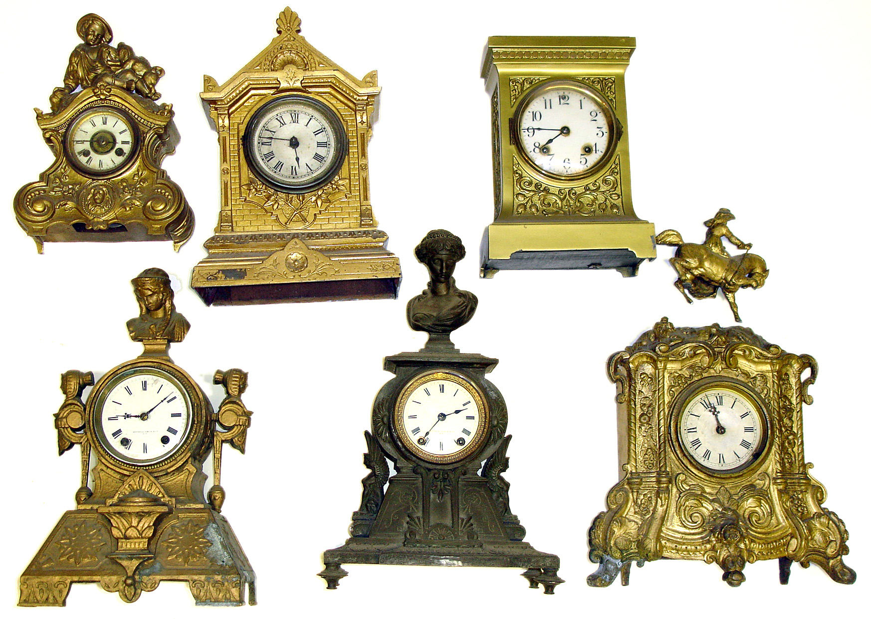 Six Connecticut cast metal mantel clocks. 2 Seth Thomas' Sons, 1 Ansonia Brass Co, 2 figurals and 1 architectural. — Antique Clocks Price Guide