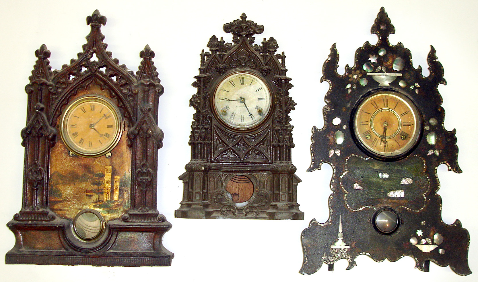 Three large 8-day Connecticut iron fronts Mostly complete cases and movements. Smallest has "C. Jerome" dial. — Antique Clocks Price Guide