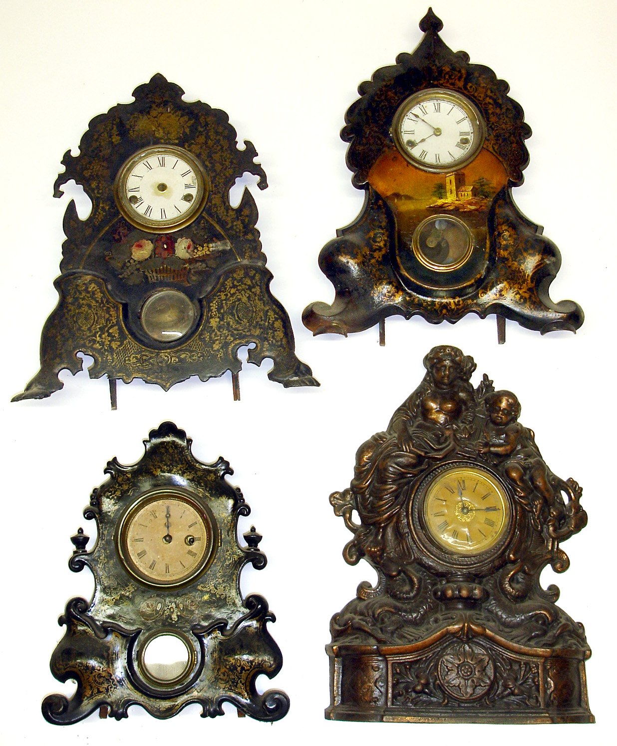 Four Connecticut iron front clocks. 2 with American Clock Co. inside labels, largest (with pin-pallet movement) is 17" high. — Antique Clocks Price Guide