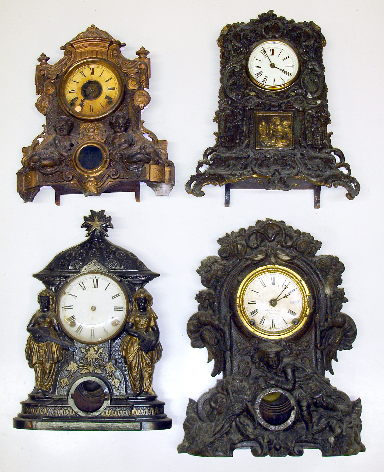 Four Connecticut 8-day iron fronts Detailed figures. One with James Wood and Co. rear label, largest with J.J.Beals and Son, Boston dial is 18" high. — Antique Clocks Price Guide