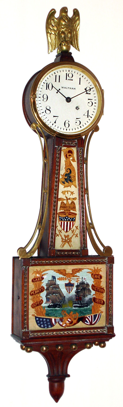 Waltham Watch Co., Waltham, Mass., miniature presentation banjo clock 15J 8 day time only spring driven movement in mahogany case with rope front banding and painted metal dial, c1930 — Antique Clocks Price Guide