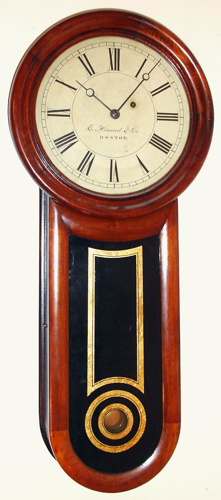 E. Howard and Co., Boston, Mass., "No. 11 Keyhole", 8 day time only weight driven movement in a cherry case with partial rosewood graining, painted iron dial, c1890 — Antique Clocks Price Guide