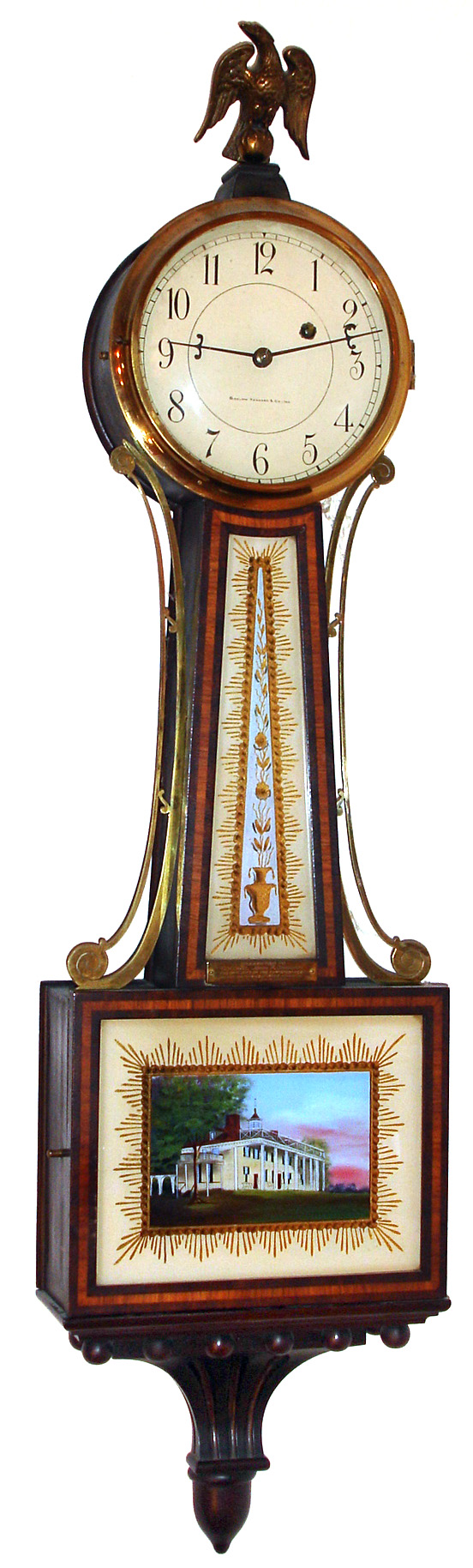 E. Howard and Co., Boston, Mass., "No. 95 Banjo" wall clock 8 day time only weight driven movement in an unusual mahogany cross banded case with private label enamel metal dial marked "BIGELOW KENNARD and CO. INC." and "E. HOWARD and CO. BOSTON", c1927 — Antique Clocks Price Guide