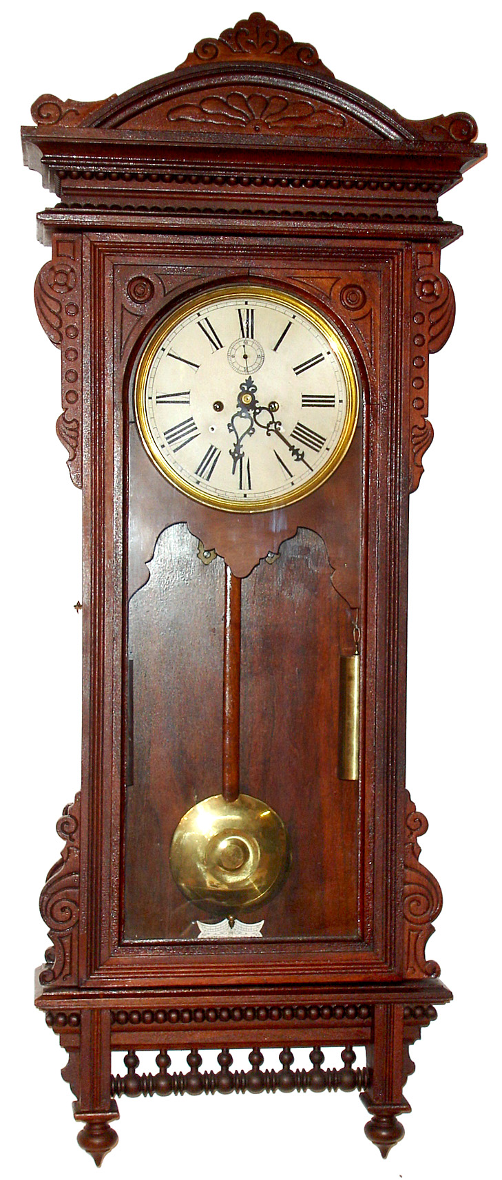Waterbury Clock Co., Waterbury, Conn., "Regulator No. 57" wall clock 8 day, time only, 2-weight driven movement in walnut case with painted metal dial with second's bit, c1905 — Antique Clocks Price Guide