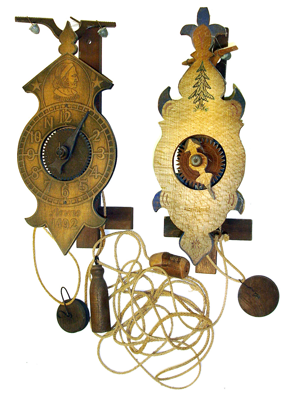 Two 20th century foliot wooden works wall clocks. One Columbus marked 1492 (not real date of manufacture as some novices have thought), one German. — Antique Clocks Price Guide