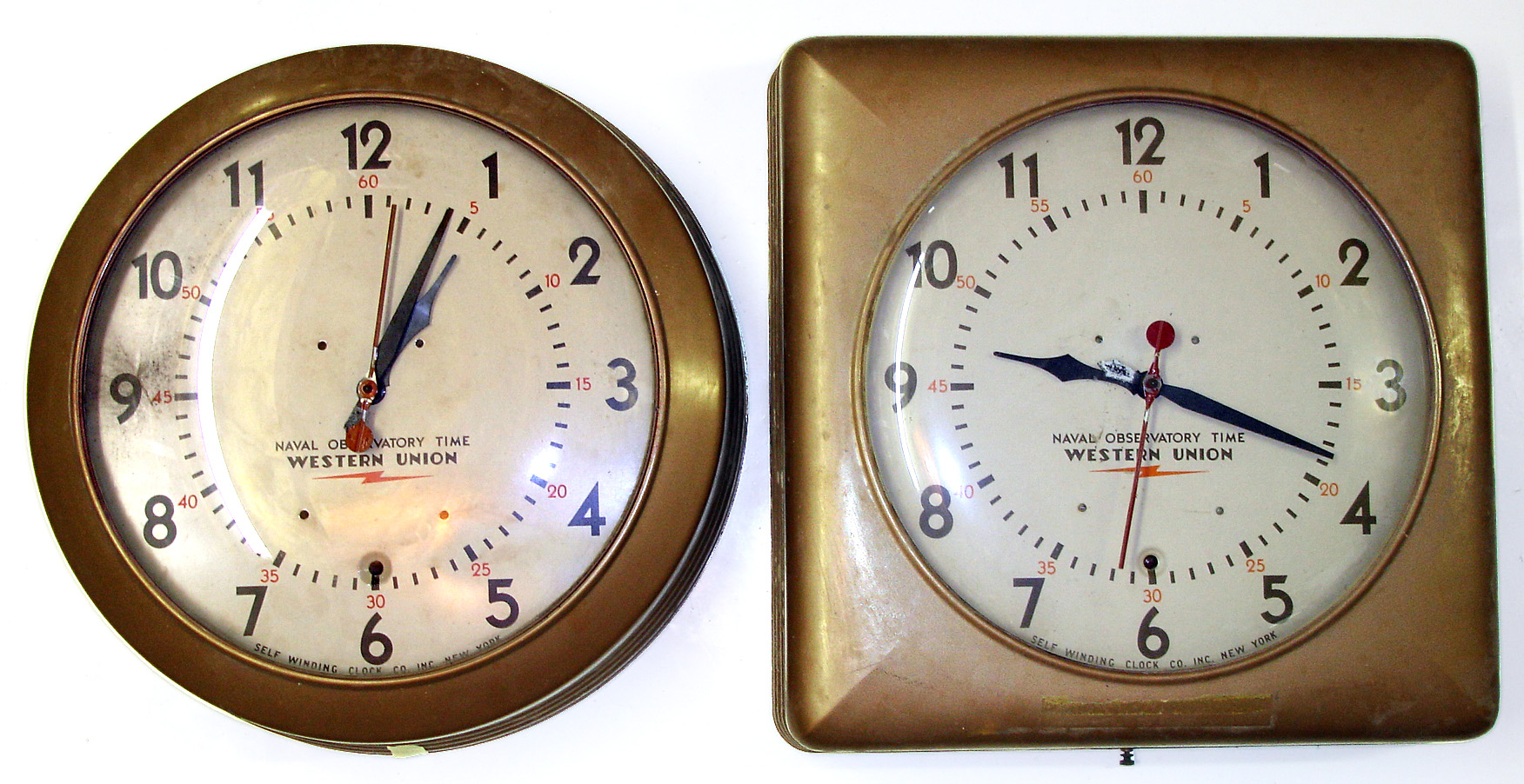 Two large Western Union Self Winding Clock Co. gallery clocks. Electrically wound movements leased to distribute standard "Naval Observatory Time". Sweep seconds, one square case, one round, 14" dials. — Antique Clocks Price Guide