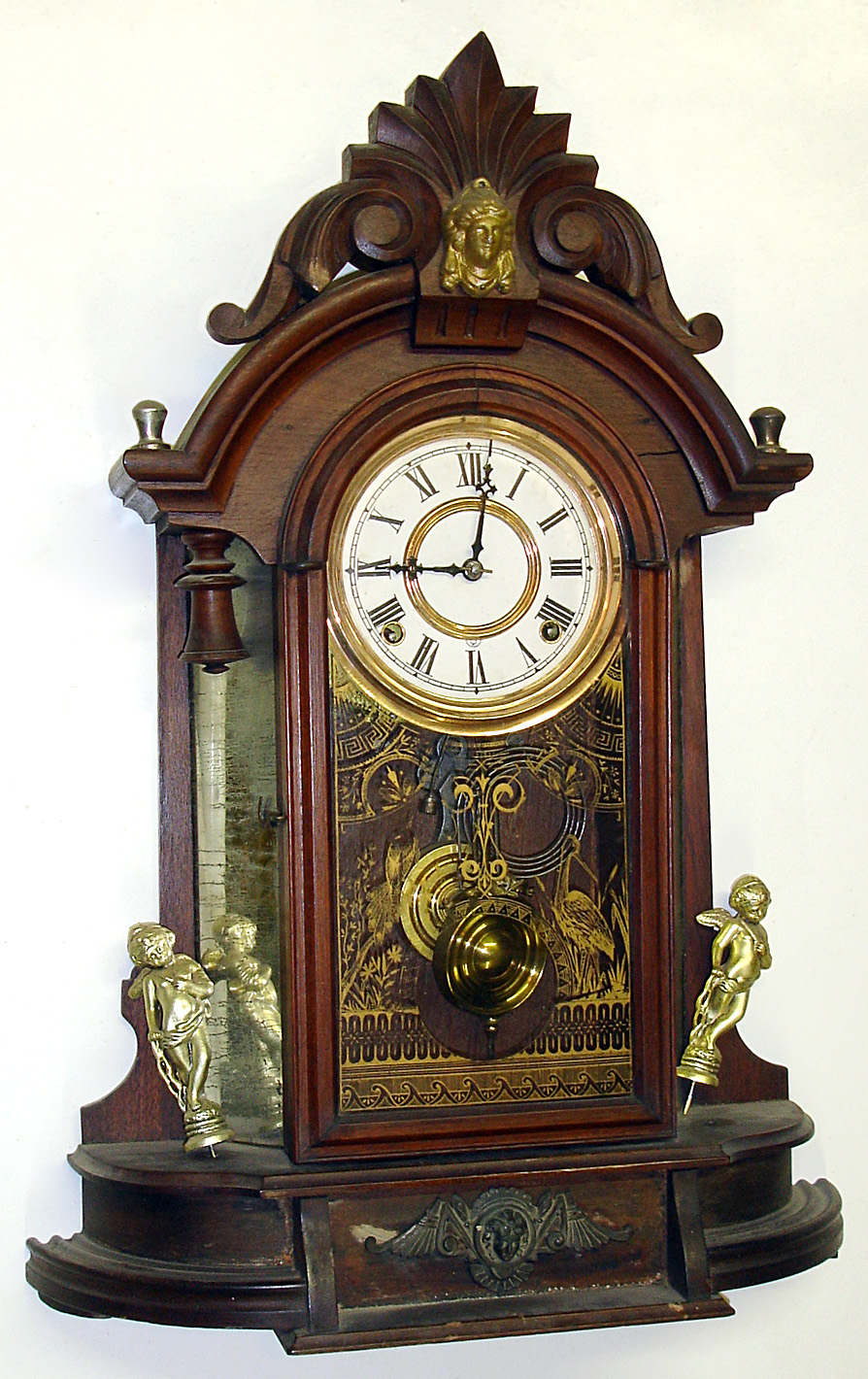 Ansonia "Triumph" mirror side walnut case with Kroeber 8 day movement. — Antique Clocks Price Guide