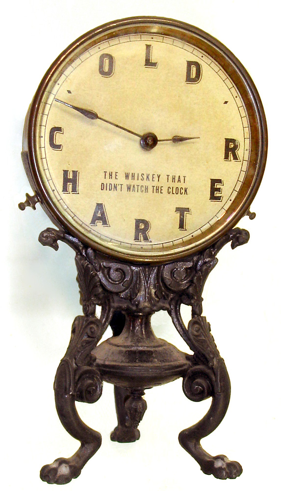 Old Charter advertising 8 day cast metal novelty clock, c1890. — Antique Clocks Price Guide