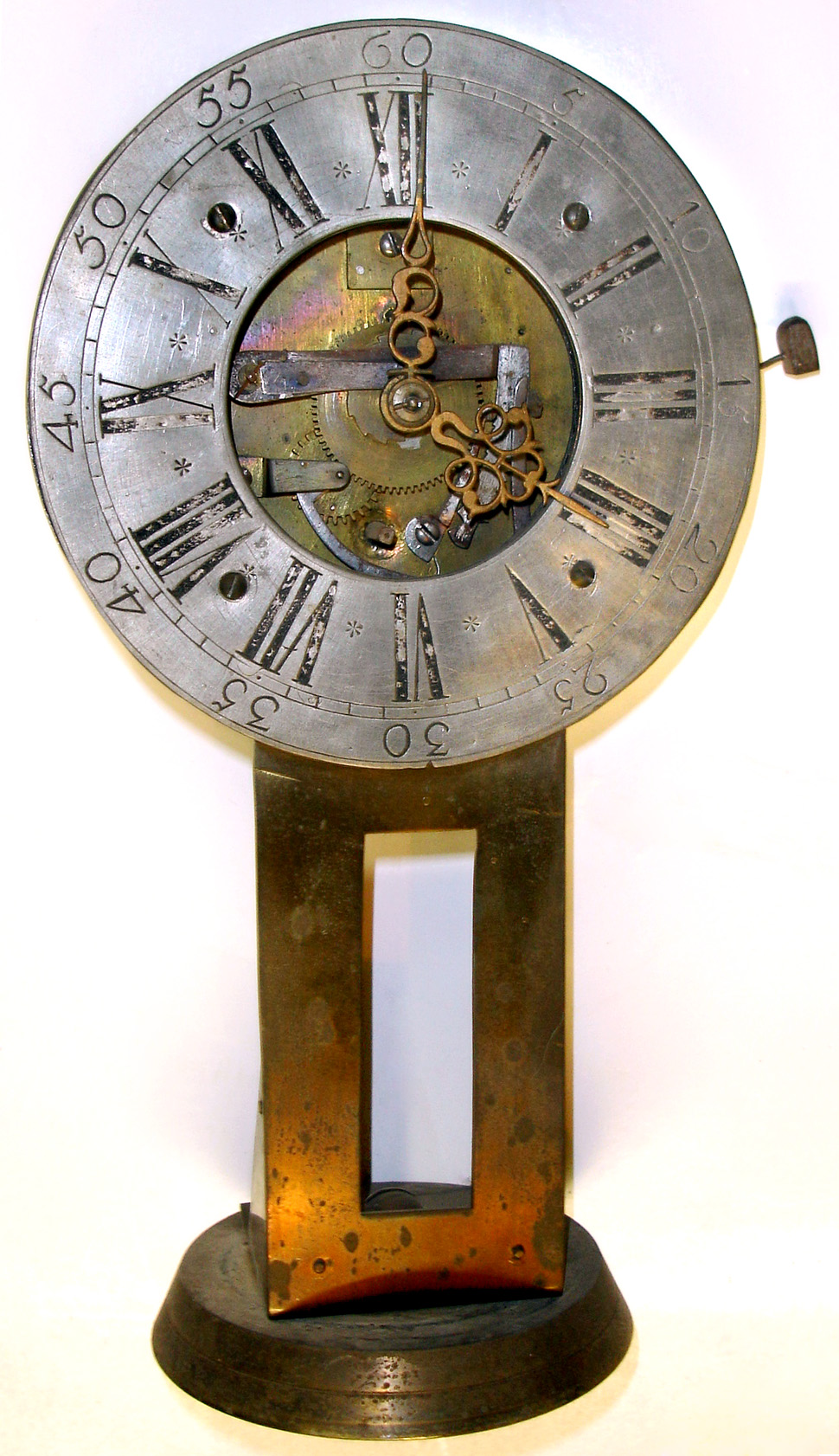 18th Century Continental brass movement and silvered dial on later metal stand. — Antique Clocks Price Guide