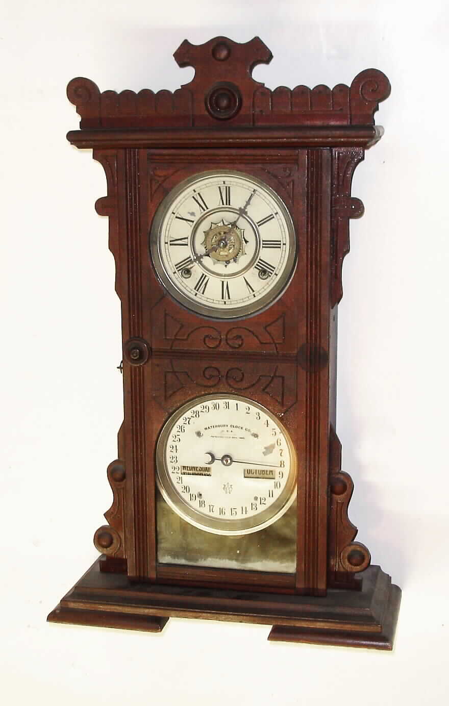 Waterbury "Calendar No. 44" walnut 8 day time/strike/alarm shelf clock, c1891. — Antique Clocks Price Guide