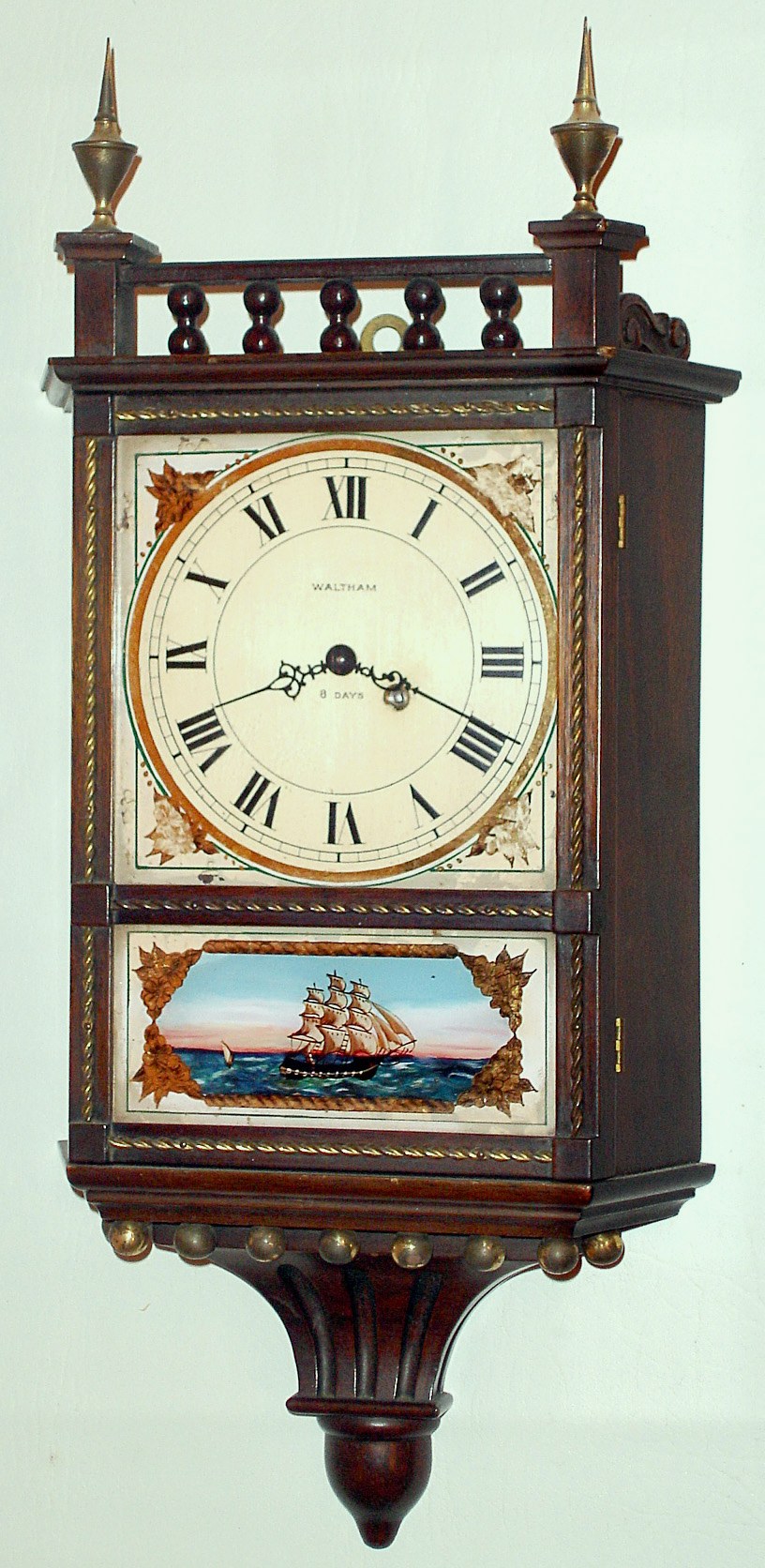 Waltham Clock Co., Waltham, Mass. miniature wall timepiece with 8 day spring driven movement in mahogany case, c1930 — Antique Clocks Price Guide