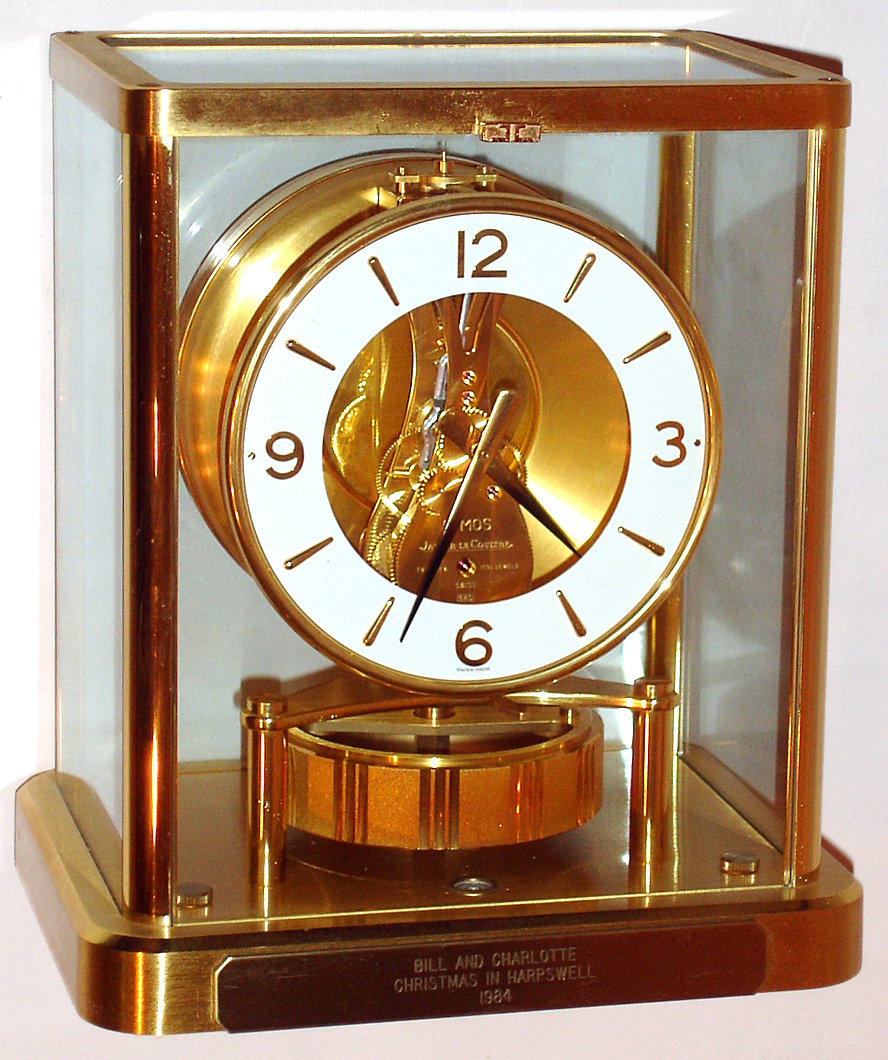 LeCoultre "Atmos", or self winding, perpetual running timepiece wound by changes in temperature and pressure, serial No. 606815. C. 1984. — Antique Clocks Price Guide