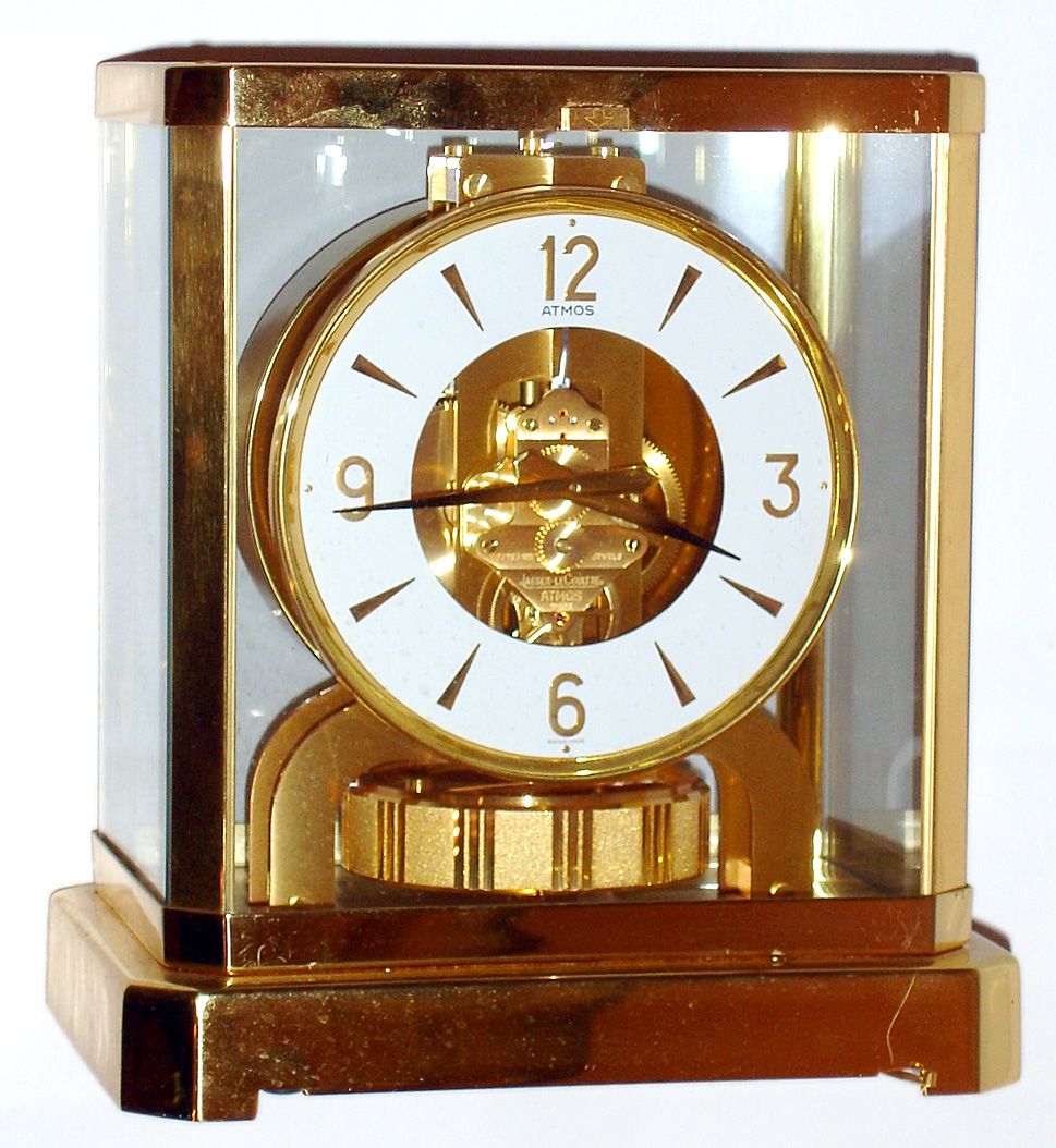 LeCoultre, "Atmos" or self winding, perpetual running timepiece wound by changes in temperature and pressure, serial No. 519482. C. 1953. — Antique Clocks Price Guide
