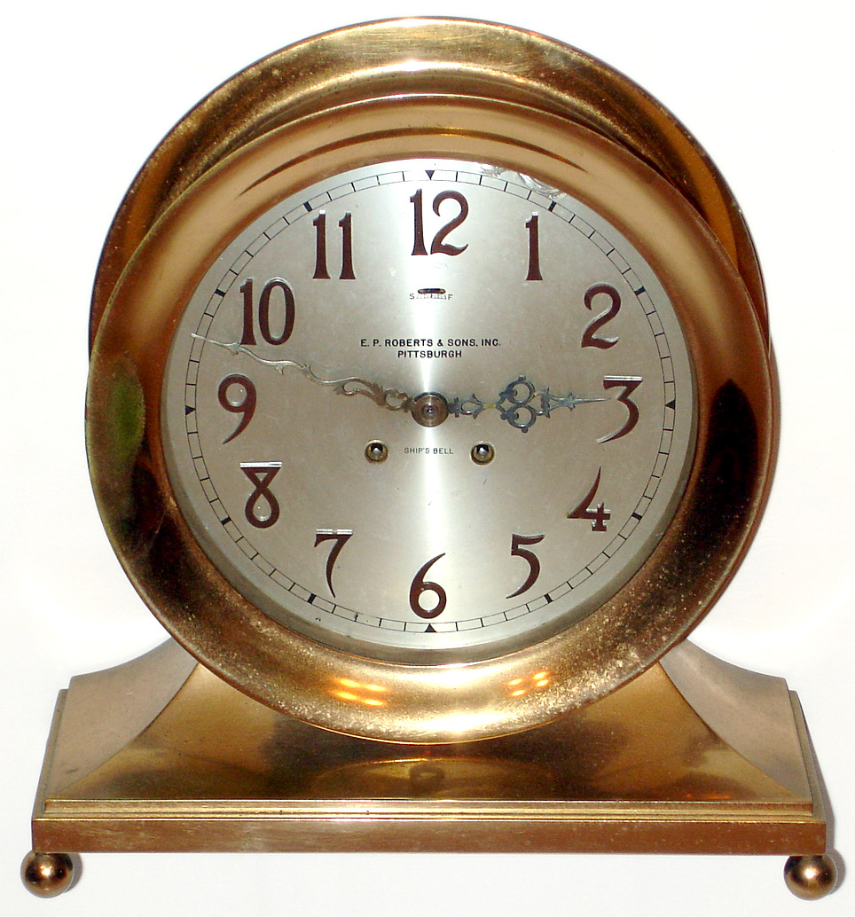 Chelsea Clock Co., "Base and Ball" or also named the "Commodore" 8-day time/strike ship's bell brass mantel clock retailed by E. P. Roberts and Sons, Inc., Pittsburgh. Serial No. 59176. c1909 — Antique Clocks Price Guide