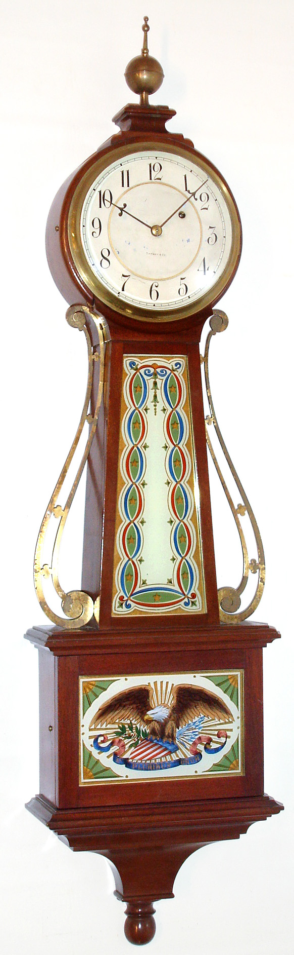 Waltham Clock Co., Waltham, Mass., banjo timepiece 8 day time only weight driven movement in mahogany case retailed by Tiffany and Co. This must have been a special order presentation timepiece made by Waltham, serial No. 6604 c1922 — Antique Clocks Price Guide