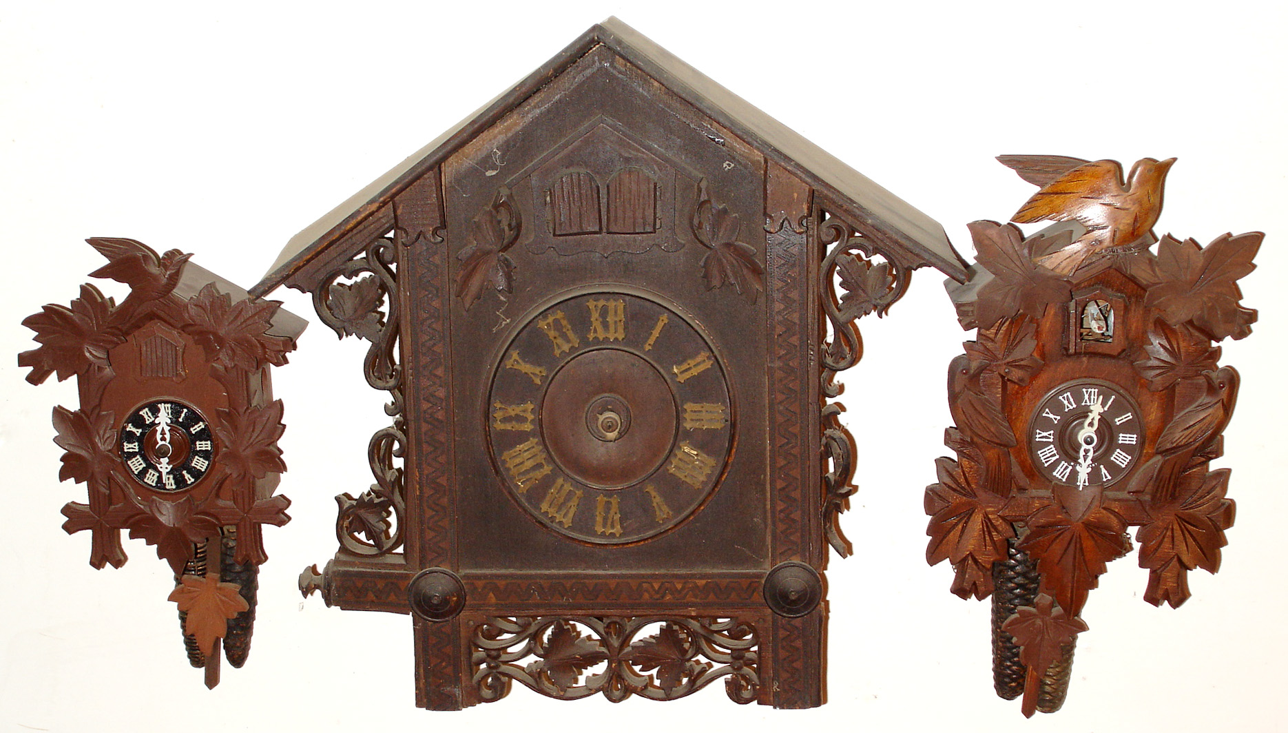 Three Black Forest German 30 hour cuckoo wall clocks. — Antique Clocks Price Guide