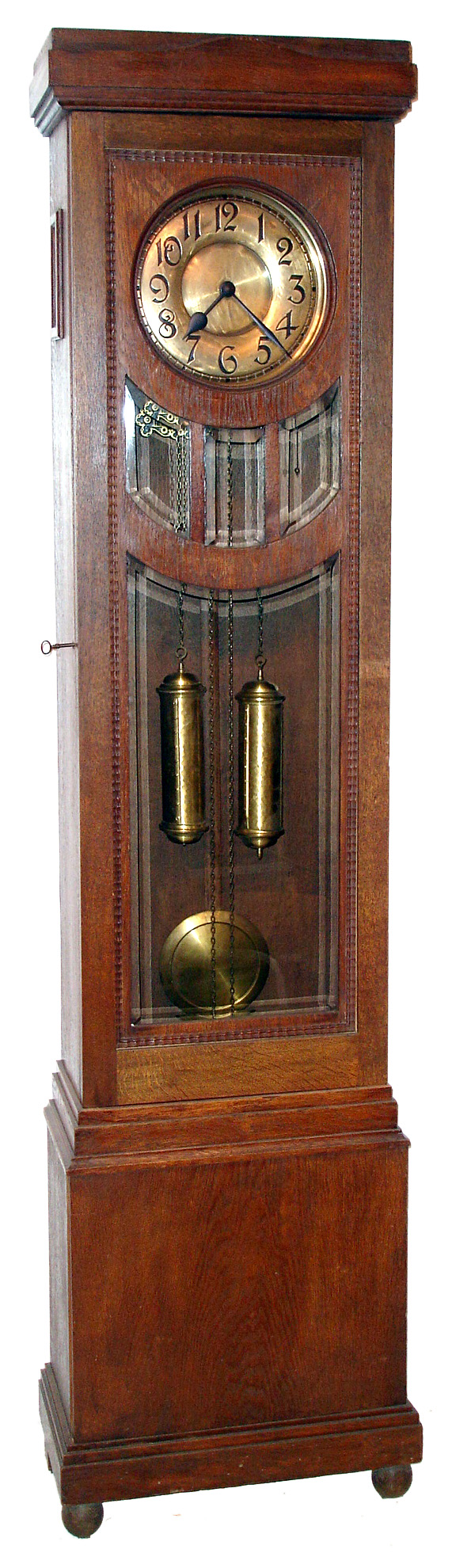 German tall case clock with 8 day time and strike weight driven movement in oak case with beveled glass panels and brass dial, weights and pendulum bob, c1910 — Antique Clocks Price Guide
