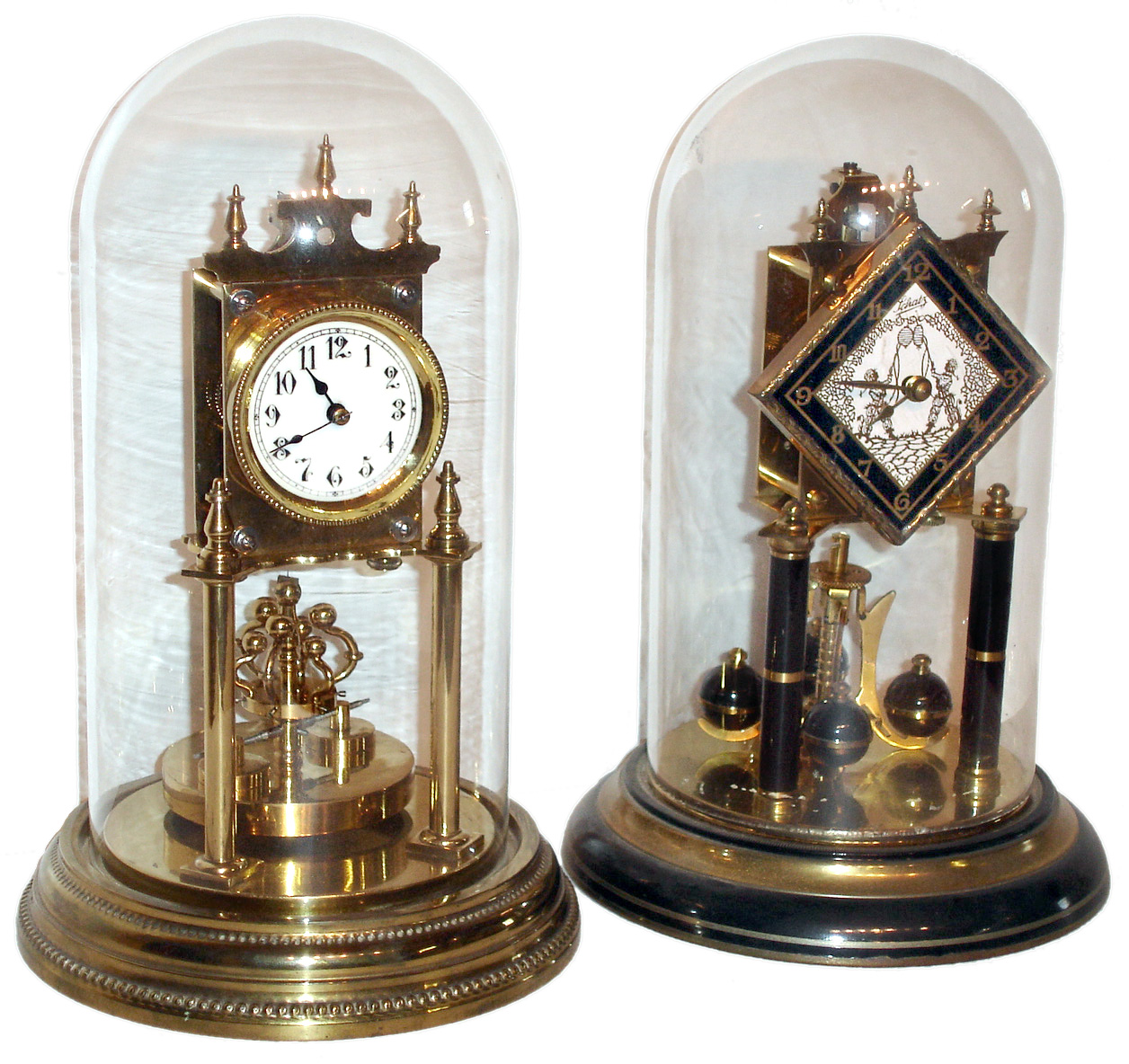Two German 400 day clocks. — Antique Clocks Price Guide