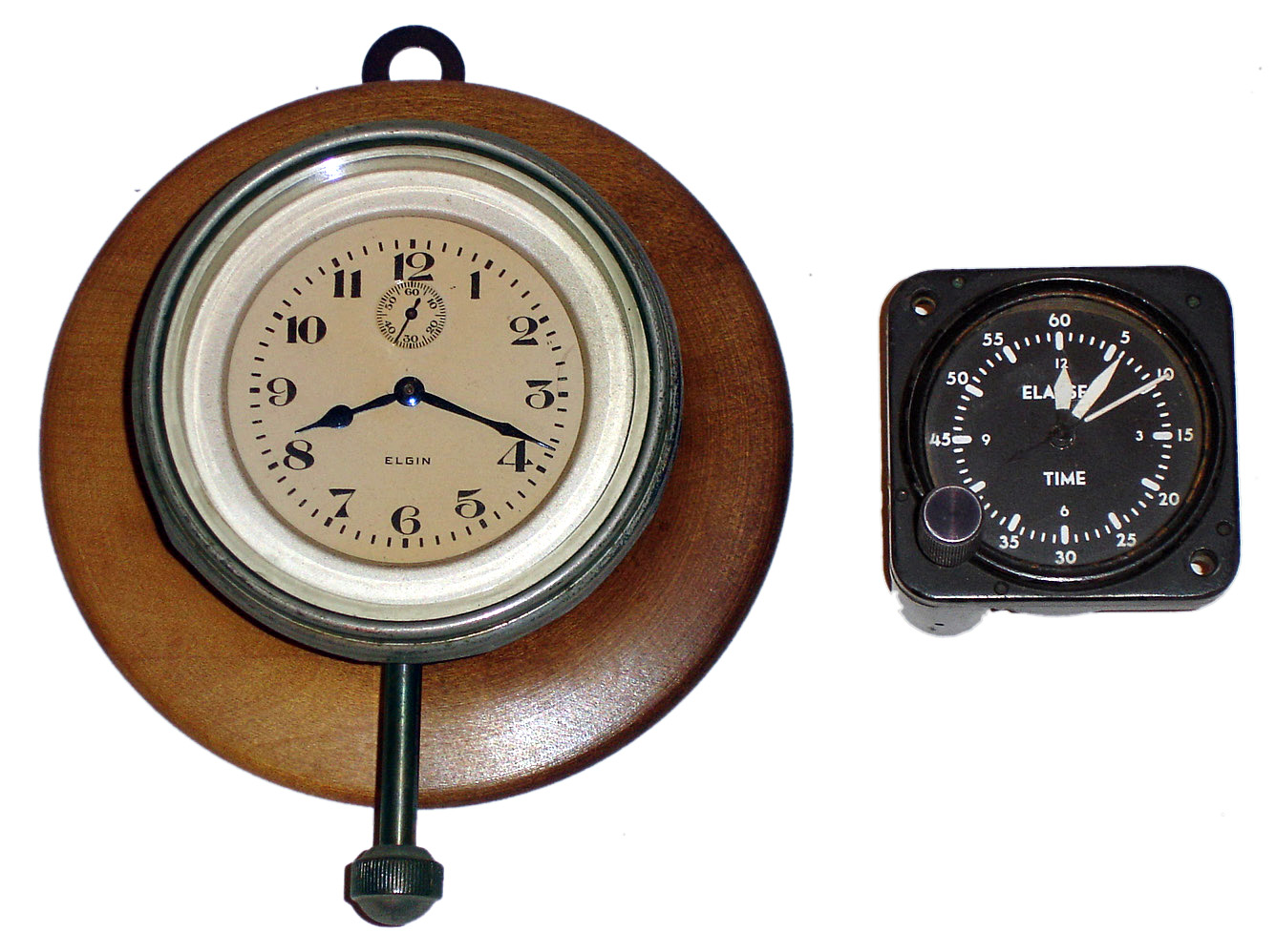 Two small metal case 20th century Elgin clocks, one U.S. Navy. — Antique Clocks Price Guide