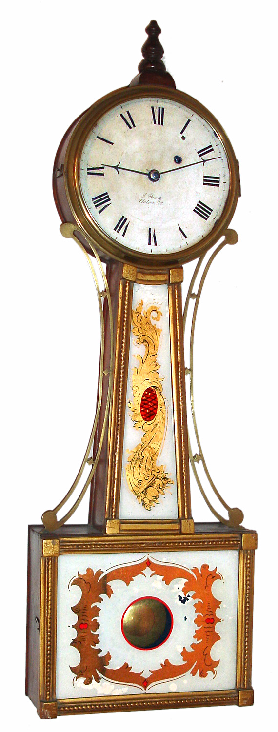 Jeremiah Dewey, Chelsea, Vermont, "Banjo" wall clock 8 day time only weight driven movement in mahogany case with gold leafed front and reverse painted throat and lower tablet and iron painted dial, c1829 — Antique Clocks Price Guide