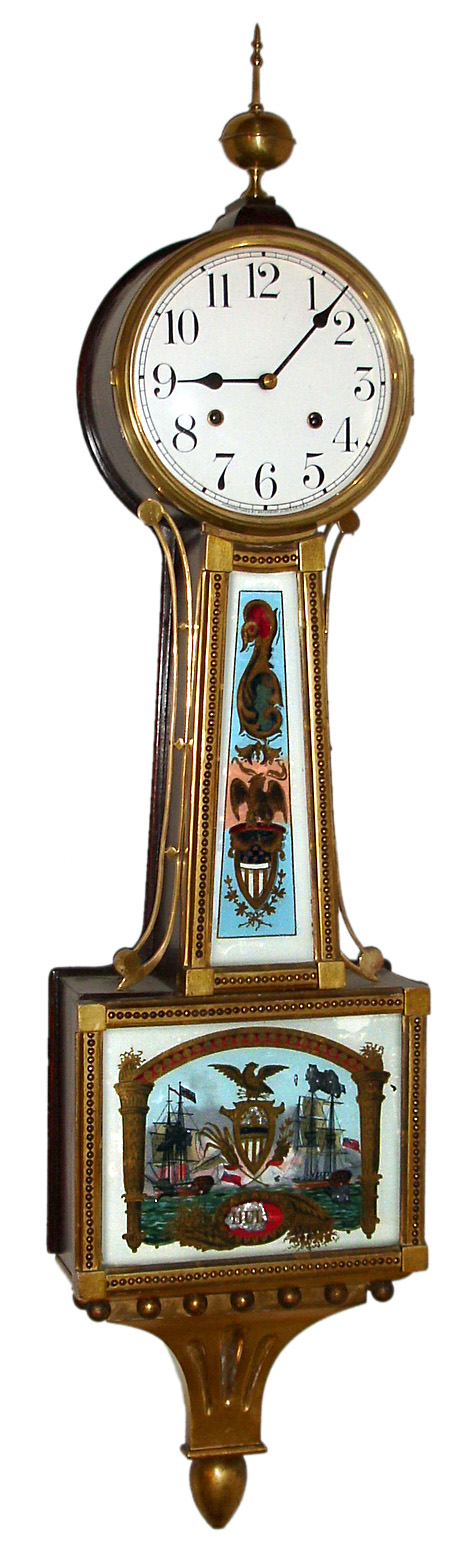 Waterbury Clock Co., Waterbury, Conn., "Willard No. 3" banjo wall clock 8 day time and strike spring driven movement in gold leafed front rope turned mahogany case with reverse painted throat and lower glass tablets and white enamel dial, c1910 — Antique Clocks Price Guide