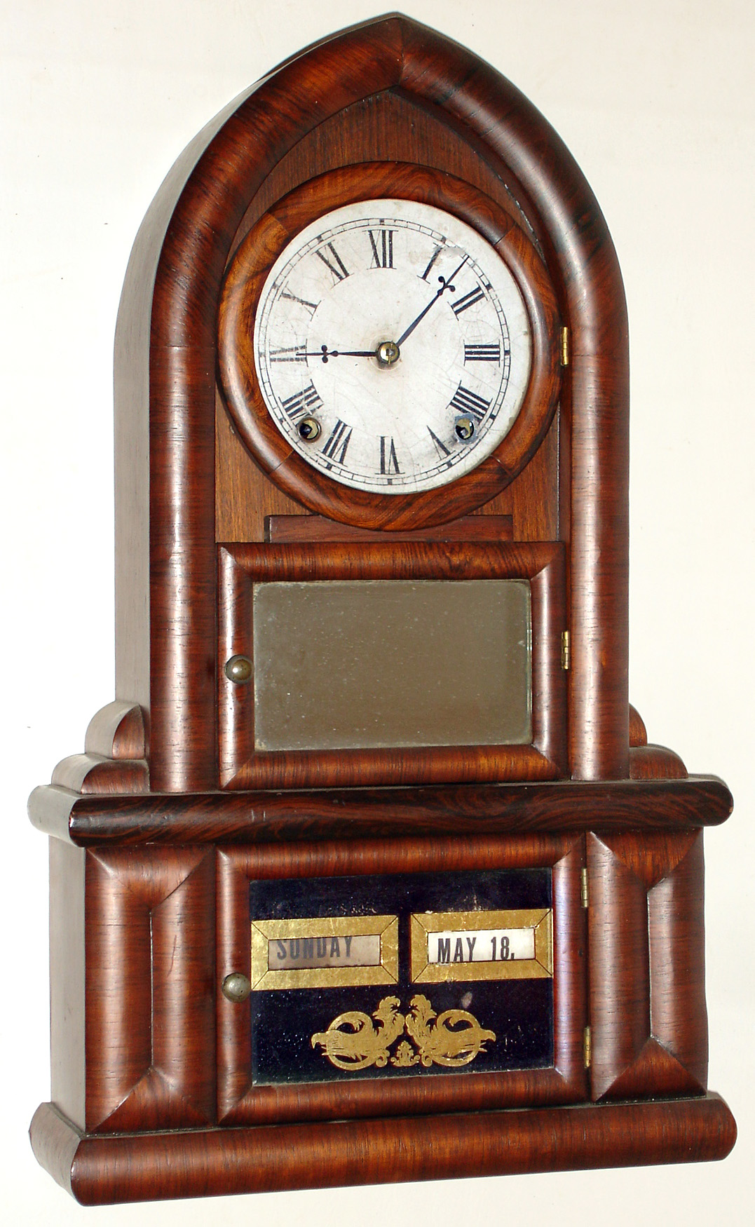 E. N. Welch Mfg Co., Forestville, Conn., "Beehive" type mantel clock with Alfonzo Boardman one year calendar mechanism 8 day time and strike spring driven movement in rosewood veneer case with reverse painted lower tablet and painted metal dial, c1870 — Antique Clocks Price Guide