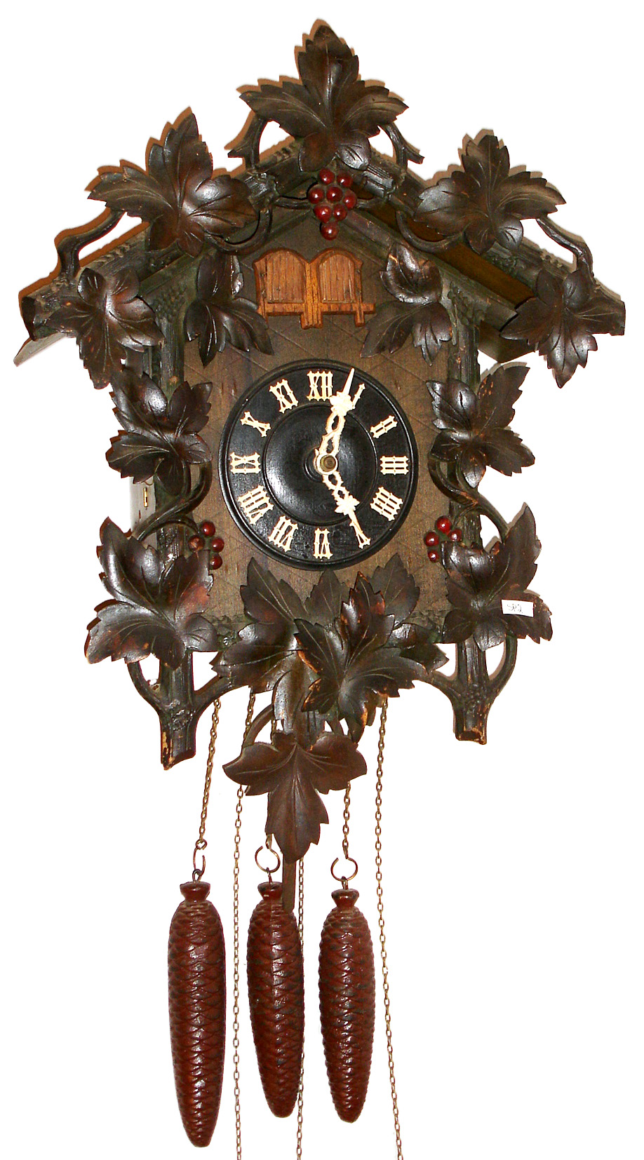 Cuckoo clock three weight with 30 hour cast brass time and strike movement in carved Black Forest case, c1880 — Antique Clocks Price Guide