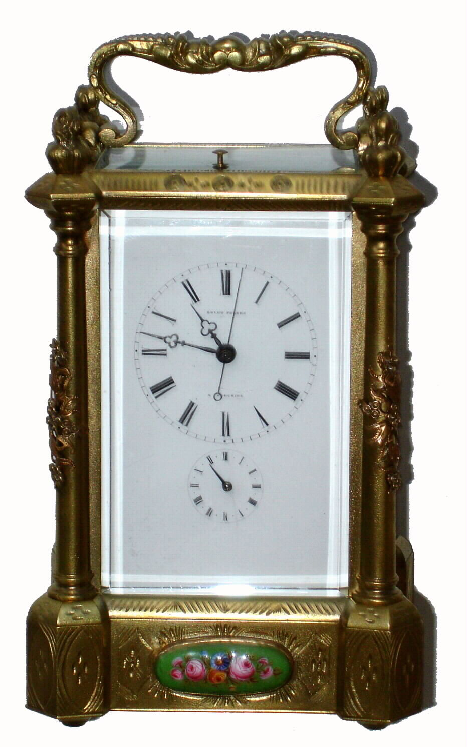 French, Brass cased carriage clock, with columns, engraving and case appliques, for the eastern market. Note the bell is for the alarm only, Hour strike is on a gong in the base and a fine chain extends from the articulated gong hammer up to the striking arm in its normal position, c1855 — Antique Clocks Price Guide