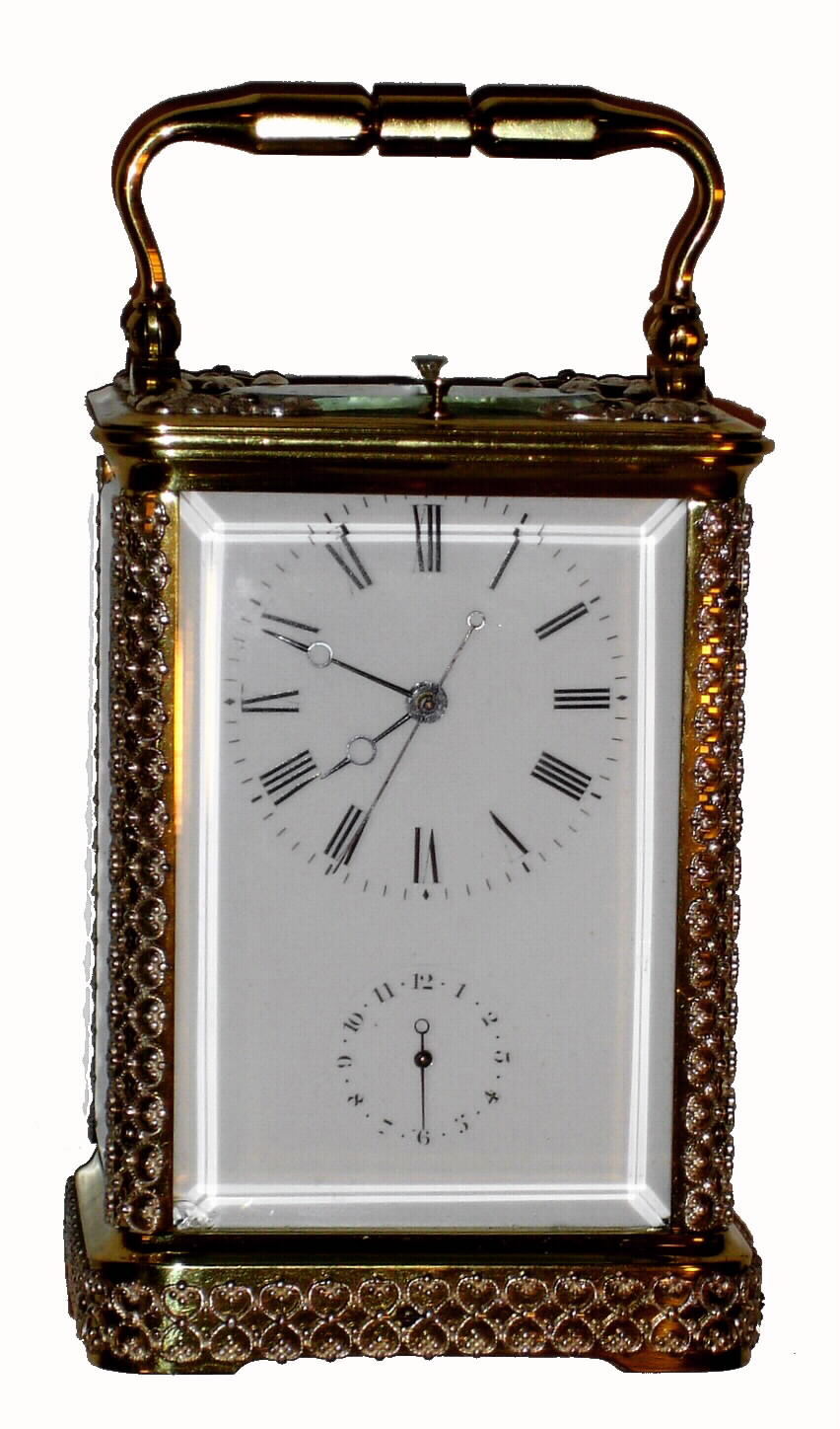 French, Brass Cased Carriage clock for the Asian market, center seconds, the case decorated with silvered brass filigree on the base, quarter columns and top, and with center seconds. The rear plate has markings for Alarum (sic) wind and Alarum set, plus cuneiform markings, perhaps from Tokyo or S'pore. In any case this is a rear plate rack and snail model that has been widely reproduced in China, and it is likely they used one of this model to copy, c1900 — Antique Clocks Price Guide